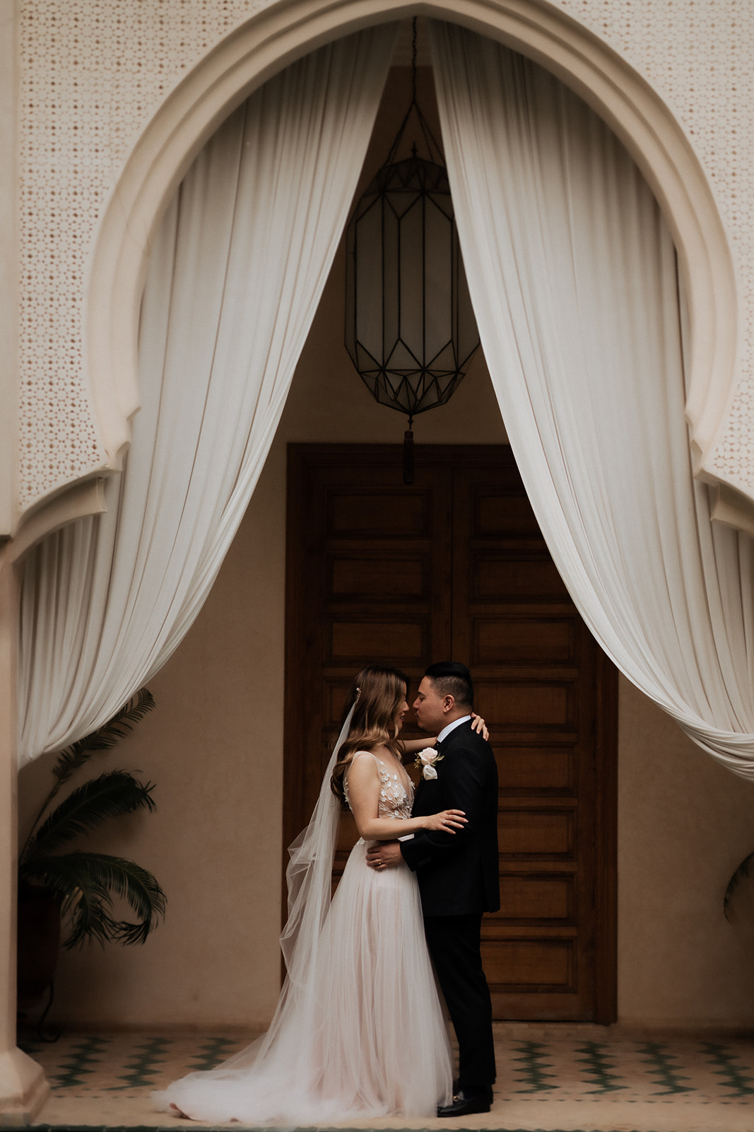Elopement wedding at al maha marrakech, a man and woman in a wedding dress